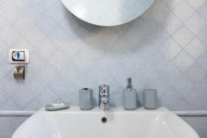 Koupelna v ubytování Fior Di Loto Central + 47 fotografií