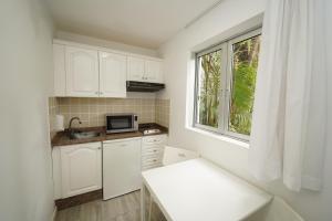 Kuchnia lub aneks kuchenny w obiekcie Hotel RF San Borondon