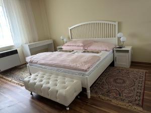 Posteľ alebo postele v izbe v ubytovaní APARTMEN PRAHA