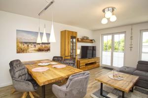 Posezení v ubytování Nahe dem Seglerhafen, Balkon, eigene Sauna - Alte Fischfabrik Lauterbach FeWo 10