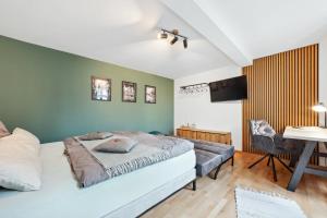 Postel nebo postele na pokoji v ubytování Apartment am Albertsplatz im Zentrum
