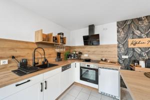 Kuchyň nebo kuchyňský kout v ubytování Apartment am Albertsplatz im Zentrum