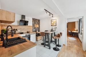 Kuchyň nebo kuchyňský kout v ubytování Apartment am Albertsplatz im Zentrum