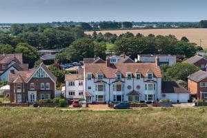 an aerial view of a large house in a town at Seaview at No.5 Mundesley in Mundesley