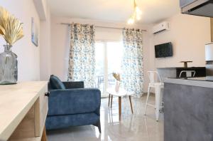 Μια τηλεόραση ή/και κέντρο ψυχαγωγίας στο Alexandra Comfort Apartments