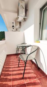 Rõdu või terrass majutusasutuses Zlatni Pijesak - Apartmani Čanj