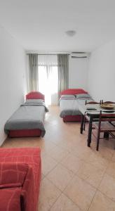 Voodi või voodid majutusasutuse Zlatni Pijesak - Apartmani Čanj toas
