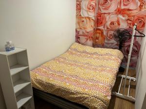 Postel nebo postele na pokoji v ubytování Sky World Cozy Home