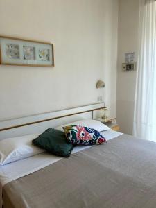 Postel nebo postele na pokoji v ubytování Hotel Soave