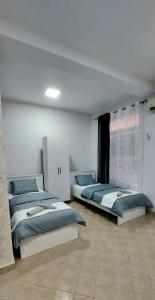 Postel nebo postele na pokoji v ubytování Apartman SPLENDID