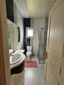 O baie la location saisonnière un étage de villa à hammam sousse