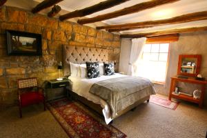 Rúm í herbergi á Moolmanshoek Private Game Reserve