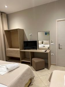 Kuchyň nebo kuchyňský kout v ubytování Deni's Hotel