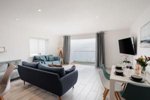 Μια τηλεόραση ή/και κέντρο ψυχαγωγίας στο Royal Cliff Luxury Apartments - The Bay