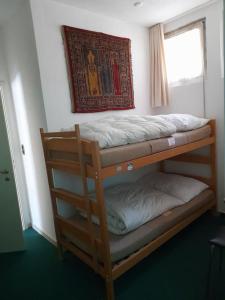 Postel nebo postele na pokoji v ubytování Padiglione Castagneto