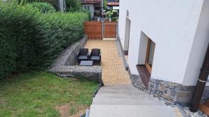 Vonkajšia záhrada v ubytovaní Apartmány Horní Bečva
