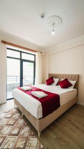 Postel nebo postele na pokoji v ubytování Cappadocia Ürgüp Apart Hotel