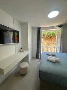 Ένα ή περισσότερα κρεβάτια σε δωμάτιο στο Amaro Luxury Room & Studio Apartman with Balcony +42 φωτογραφίες