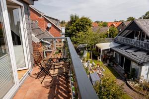 an aerial view of a balcony of a house at Gasthaus Deichkieker - Wo die Nordsee dich umarmt und Erholung beginnt in Horumersiel