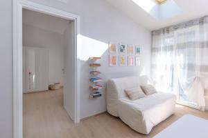 Кровать или кровати в номере La casa di Marietta e Bacì