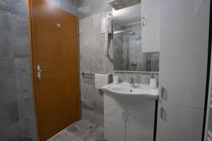Kúpeľňa v ubytovaní Apartment Familie Matovina + 12 fotografií