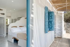 a bedroom with a bed in a room at Politimis Studio N2 in Amorgos