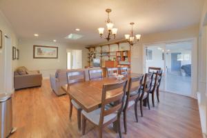a dining room and living room with a table and chairs at Quiet Salinas Vacation Rental 10 Mi to Beach in Salinas
