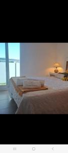 Posteľ alebo postele v izbe v ubytovaní Apartamento Romero valencia