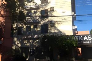 una sombra de un edificio al costado de una calle en AP. 06 DO CANTINHO DO SOSSEGO, en Dourados