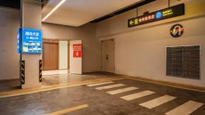 Fotografie z fotogalerie ubytování 铂领荟酒店（成都军区总医院熊猫基地西大门地铁站店） v destinaci Čcheng-tu