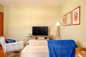 Et tv og/eller underholdning på Capivari - lareira, aquecedores e pet friendly