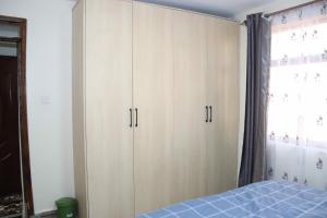 Postel nebo postele na pokoji v ubytování Nikita Holiday Homes