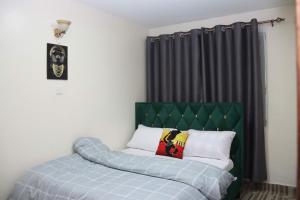 Postel nebo postele na pokoji v ubytování Nikita Holiday Homes