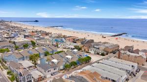an aerial view of a beach with houses and condos at 122 Thirty Third Street in Newport Beach +64 photos