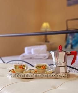 En eller flere senge i et værelse på Petralia Guest House