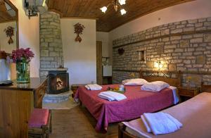 Postel nebo postele na pokoji v ubytování Guesthouse Gonia