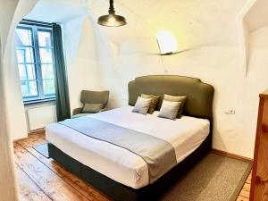 Postel nebo postele na pokoji v ubytování Stadtjuwel am Neusiedlersee