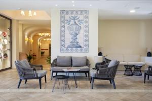 A seating area at Mangia's Selinunte Resort