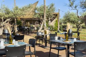 A restaurant or other place to eat at Mangia's Selinunte Resort