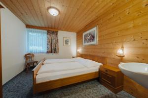 Postel nebo postele na pokoji v ubytování Peak View Appartements