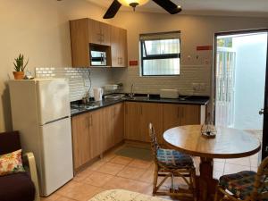 Η κουζίνα ή μικρή κουζίνα στο The High Street Accommodation +8 φωτογραφίες