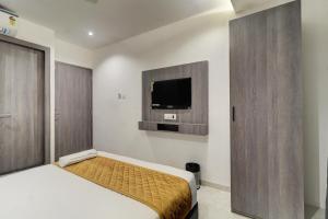 Postel nebo postele na pokoji v ubytování Hotel Isra International, BKC