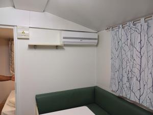 Postel nebo postele na pokoji v ubytování agricampeggio Sivillage