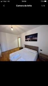 Postel nebo postele na pokoji v ubytování Miniappartamento completo