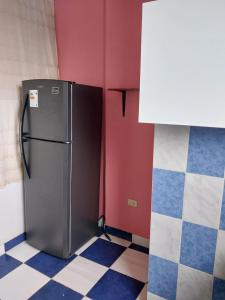 モヨバンバにあるD-302のキッチン(冷蔵庫付)が備わる客室です。
