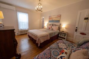 Postel nebo postele na pokoji v ubytování À Tout Venant B&B