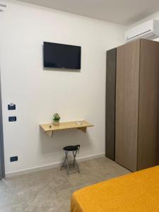 TV a/nebo společenská místnost v ubytování Fiori di Quercia