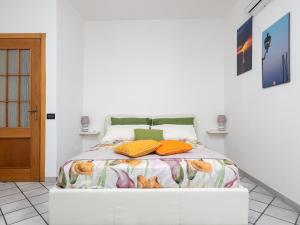 Ein Bett oder Betten in einem Zimmer der Unterkunft Giardino di Nonno Lucio - Surrounded by Lemon Tree