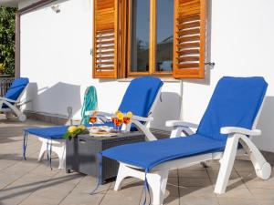 Ein Sitzbereich in der Unterkunft Giardino di Nonno Lucio - Surrounded by Lemon Tree