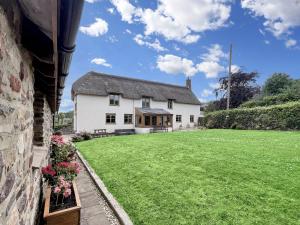 a view of the house from the garden at Splatt Barn Porlock in Porlock